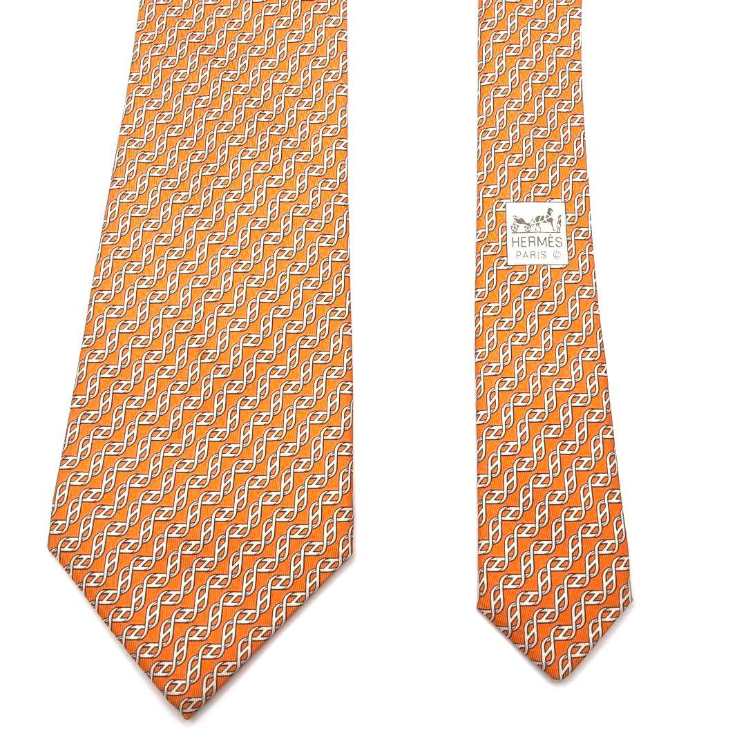 【美品】HERMES ネクタイ オレンジ ホワイト 総柄　シルク100%
