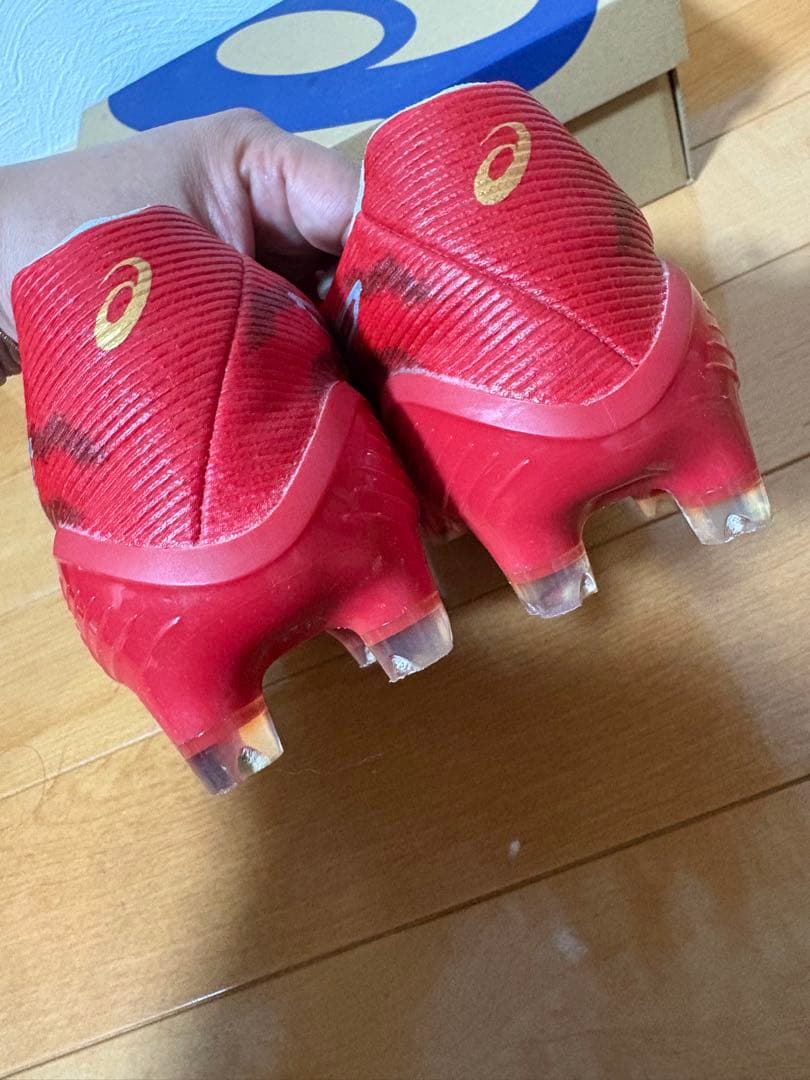 ASICS サッカースパイクアクロス2レッド 固定スタッド