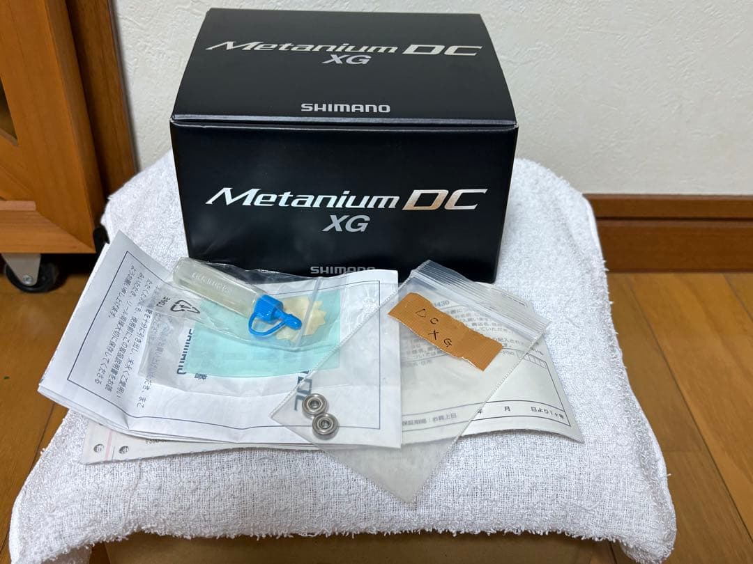 15メタニウムDC XG（右） ※かっ飛びチューニングベアリング内蔵