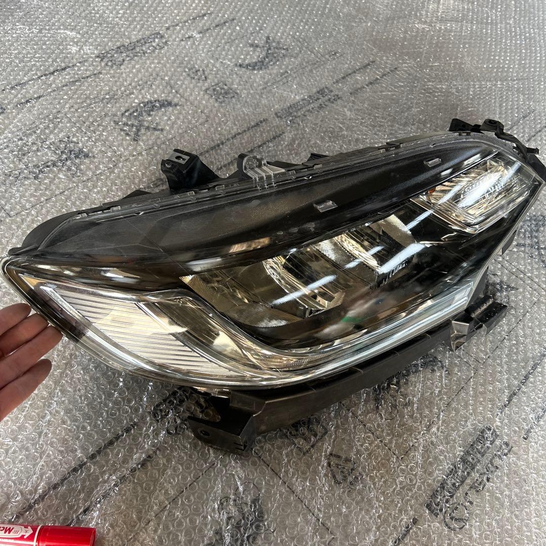 フィット　ヘッドライト　右　STANLEY W3674 ジャンク品