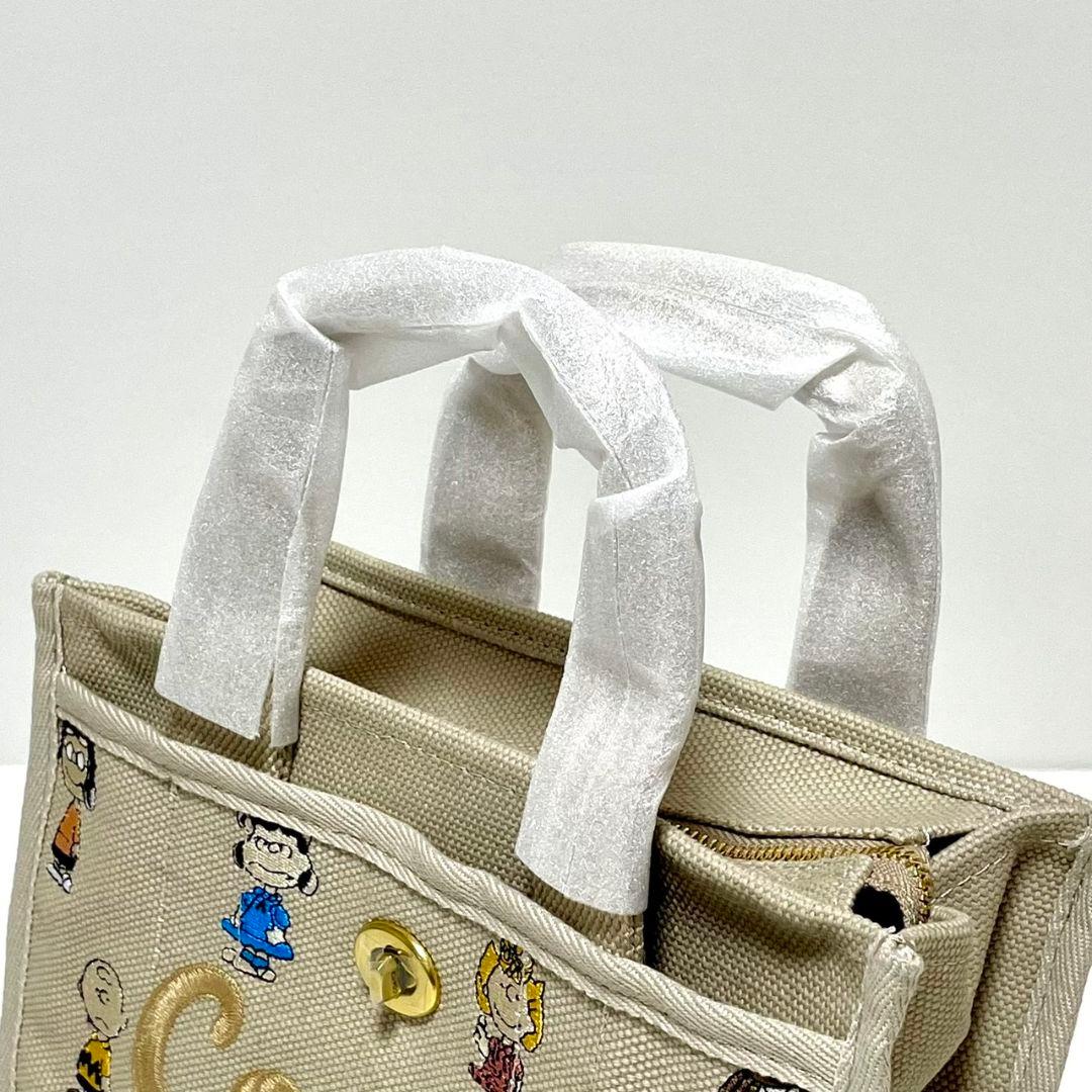 COACH コーチ カーゴトート26 スヌーピー　CBH43 ベージュ