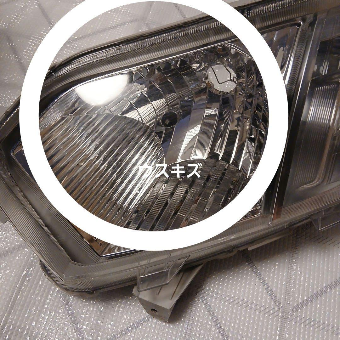 トヨタ　プロボックス　サクシードヘッドライト助手席側中古ジャンク
